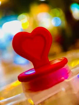 Miniture red plastic heart Stock Photos