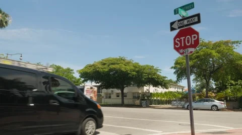 Minivan stops before stop sign Stock Footage 63279944