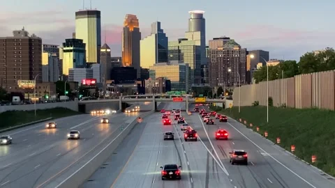 Minneapolis skyline &amp; traffic new freeway Wide dusk Stock Footage 264768853