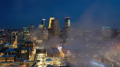 Minneapolis Skyline in Winter - Flying Through Cloud of Smoke Stock Footage