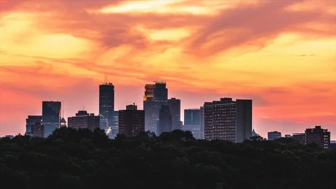 MINNEAPOLIS, UNITED STATES - 07/25/2019: Time Lapse of Sunset over Minneapolis Stock Footage