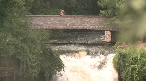 Minnehaha Falls bridge pull to wide Stock Footage 8435651