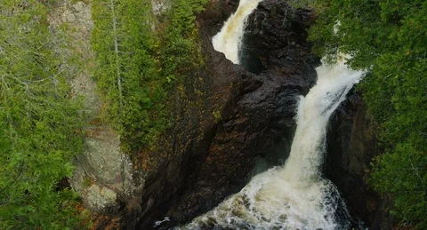 Minnesota - Devils Kettle Waterfall Tilt Up - 4K Slow Motion Stock Footage 111684676