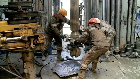 Minor accident at the oil drilling rig. Fall of worker. Stock Footage 256996813