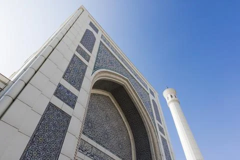 Minor mosque facade featuring intricate blue geometric tile work, Tashkent Stock Photos