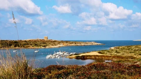 Minorca, Menorca, view with pittoresque clouds, Cap de Cavalleria Stock Footage 73107566