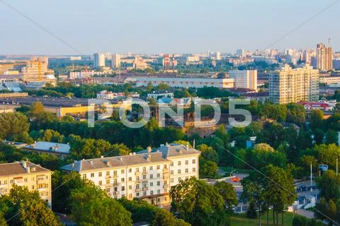Minsk (belarus) city quarter with green parks under blue sky Stock Photos