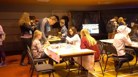 Minsk, October 2016, belarus Comic Con, children playing board games Video stock 69090272