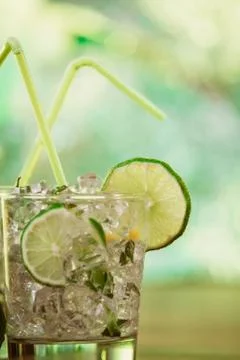 Mint and lime refreshing summer cocktails Stock Photos