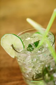 Mint and lime refreshing summer cocktails Stock Photos