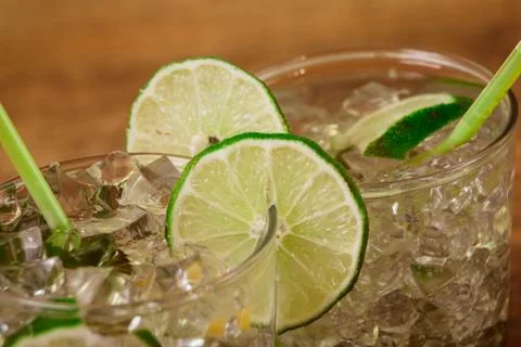 Mint and lime refreshing summer cocktails Stock Photos