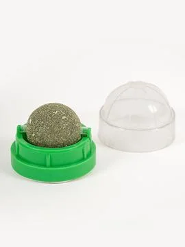 Mint ball for cats on a white background. Fun toy. Stock Photos
