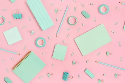 Mint color school equipment pattern on a pink pastel background. Stock Photos