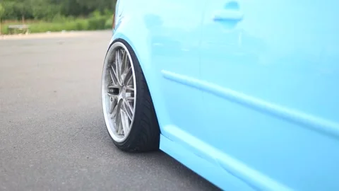 A mint-colored stance coupe with wide rims Stock Footage 162726182