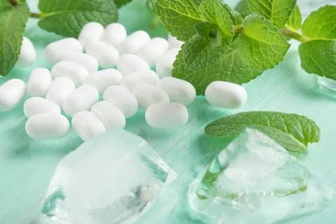 Mint dragee with mint and ice Stock Photos