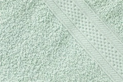 Mint green bath sheet or towels pattern texture background. Close-up, copy space Foto stock