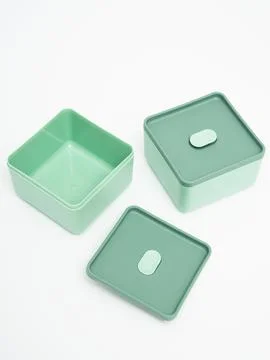 Mint green bento boxes nested open Foto stock