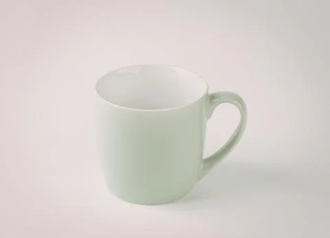 Mint green ceramic coffee mug with handle Photos