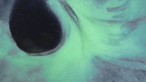 Mint Green Ink Spiral With Glitter Forming Vortex Shape Stock Footage 346607177