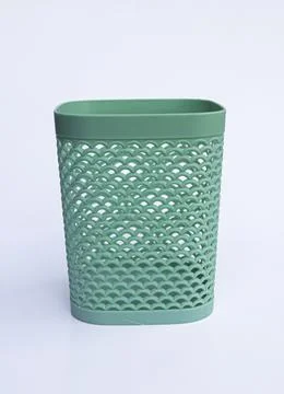 Mint Green Mesh Plastic Waste Basket Isolated for Office Organization Concept Stock Photos