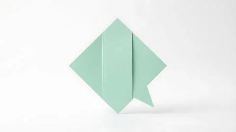 Mint green paper speech bubble icon on white background for communication a.. Stock Photos