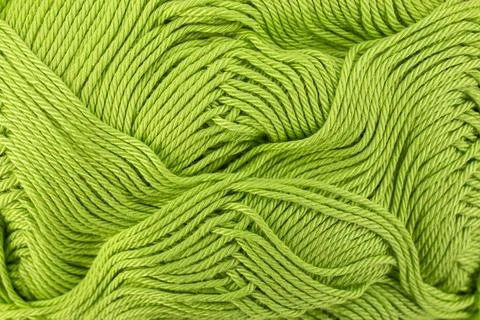 Mint green thread spool close up , abstract crochet backdrop Foto stock
