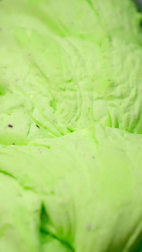 Mint ice cream in iron container. Concept of sweet treat. Stock Footage 275576649