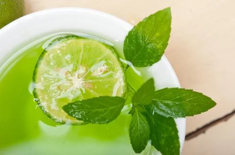 Mint infusion tea tisane with lime Stock Photos