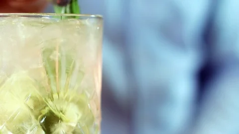 Mint leaves into a glass Stock-Footage 129663654