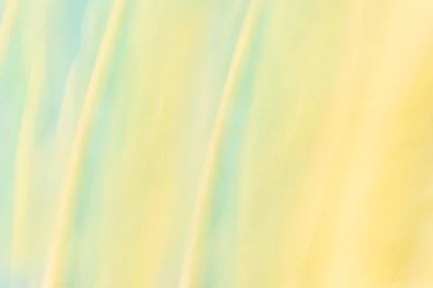 Mint yellow abstract background with gently blurred diagonal lines waves. Stock Photos