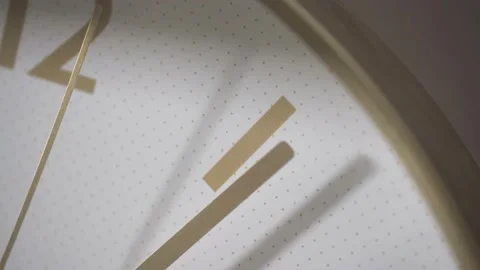 The minute hand points to the number 1, the second hand goes past. Stock Footage 162656926