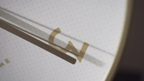 The minute hand points to the number 3, the second hand goes past. Stock Footage 162657240
