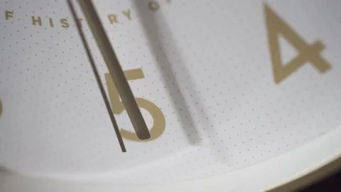 The minute hand points to the number 5, the second hand goes past. Stock Footage 162657264