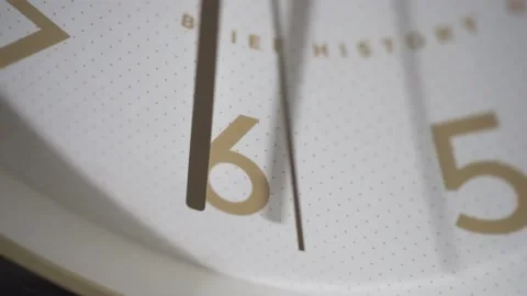 The minute hand points to the number 6, the second hand goes past. Stock Footage 162657447
