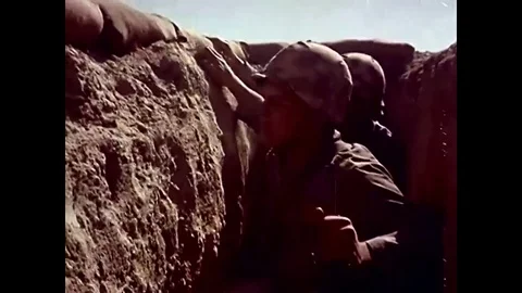 Minutes after an atomic blast, troops walk into the radioactive cloud in the Stock Footage 74700469