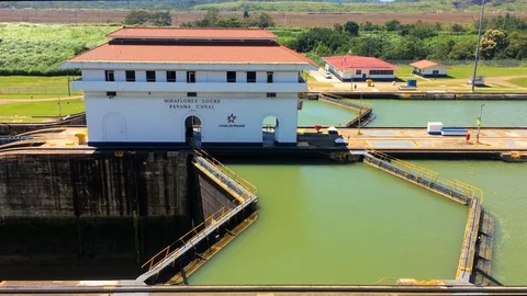 Miraflores locks are opening when the water level is equalized. Tree sailboats Stock Footage 93529621