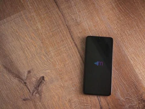 Miri app launch screen with logo on the display of a black mobile smartphone  Stock Photos