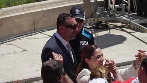Miriam Dalli stands with officials at a post-election event in Valletta Stock Footage 336489270