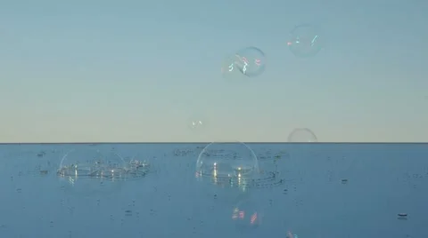 Mirror and soap bubbles in the evening sky Stock Footage 10742407