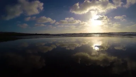 Mirror beach reflects the sky Stock Footage 79219525