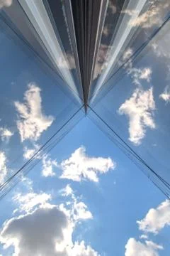 Mirror building abstract reflecting the clouds 库存照片