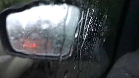 Mirror of a car under the rain Stock Footage 93523827