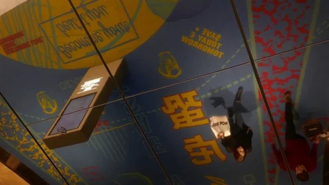 Mirror ceiling view of people walking in mall of Scandinavia shopping center Video stock 71148339