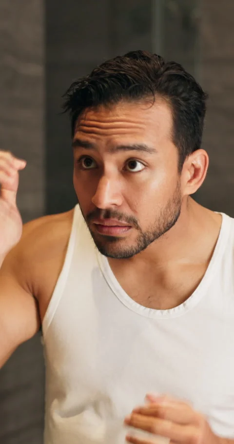 Mirror, check and man in bathroom for hair care, grooming and wellness for Stock Footage 340740124