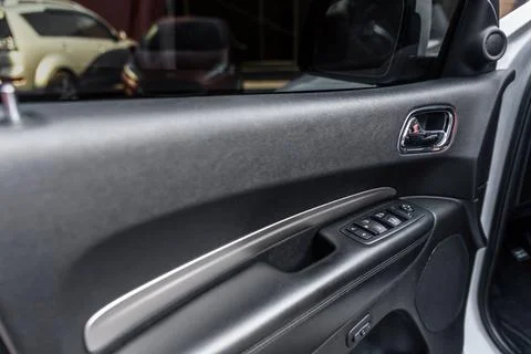 Mirror control knob and window control panel in a modern car. Automatic car Foto stock