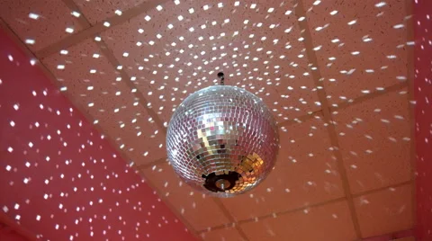 Mirror discoball spining around with reflection rays Stock Footage 66682943
