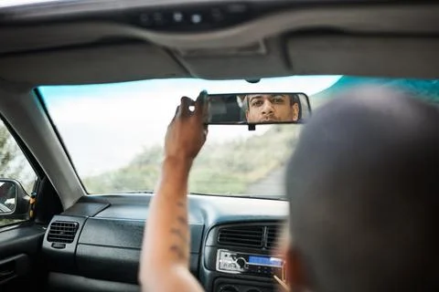 Mirror, driver and reflection with man in car for travel, check blind spot .. 写真素材