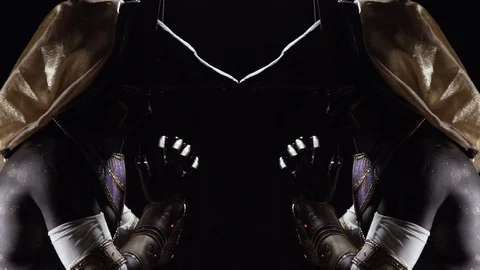 Mirror effect of Anubis in dramatic lighting rubbing his hands, slow motion Stock Footage 115631945