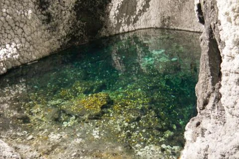 Mirror effect with beautiful reflection on the water near underground salt mine Stock Photos