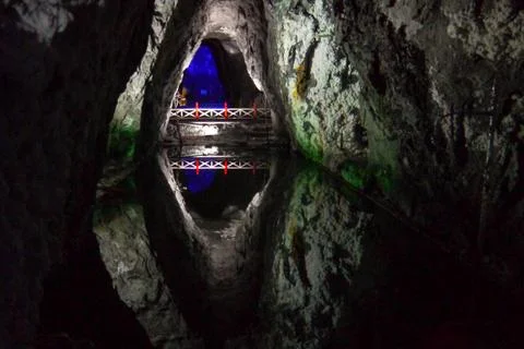 Mirror effect with beautiful reflection on the water near underground salt mine Stock Photos